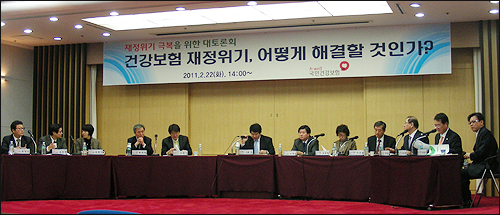 "총액제 도입 안돼" vs "하려는 시늉이라도 해야"