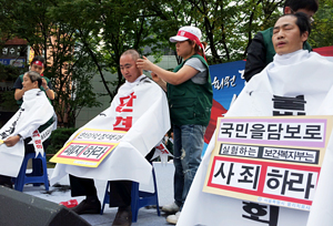 뿔난 물리치료사, 한강 투신 시도에 삭발까지…