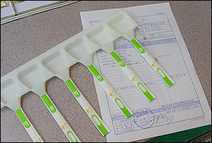 스틱형 약포지 제조 업체들, 경쟁 치열…소송전 비화